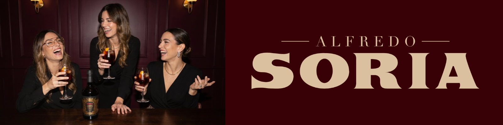 Friends raising glasses of Alfredo Soria vermouth