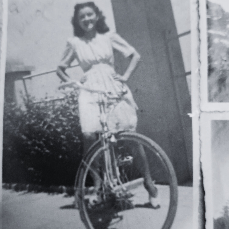 Vintage photo of woman with bicycle